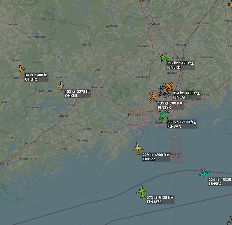 Screenshot of a map showing a bunch of planes with a large concentration on the Helsinki airport.